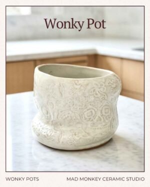 white ceramic day of the dead imprinted ceramic pot from red deer artist